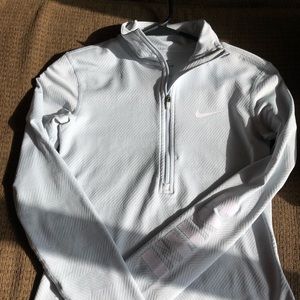 Light blue Nike 1/4 zip up jacket